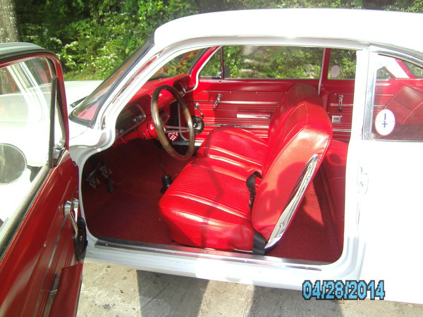 I made the instrument panel and glove box door panel out of Oak and stained them and the steering wheel ebony