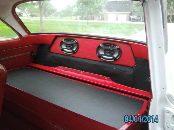 speakers behind the rear seat