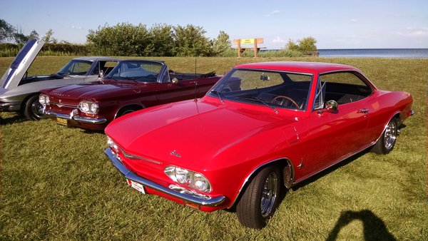 This 1965 Monza was rescued after spending 20 plus years rotting away in a barn. (&quot;63&quot; Corvette &quot;Split Window&quot; in background)