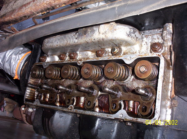 All the valve springs seem to be fully out in the head, but I still want to do a leak test to check the cylinders.