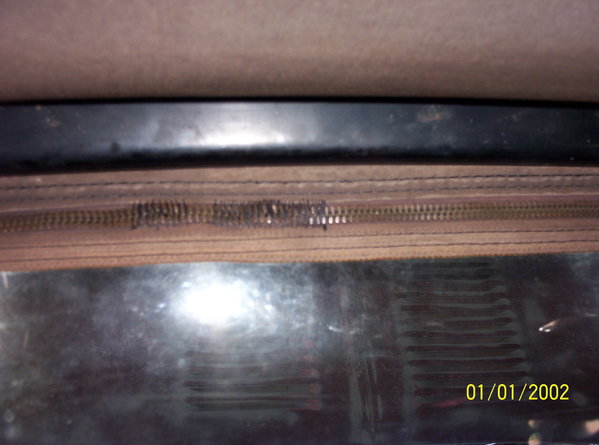 A close up of the zipper stiches