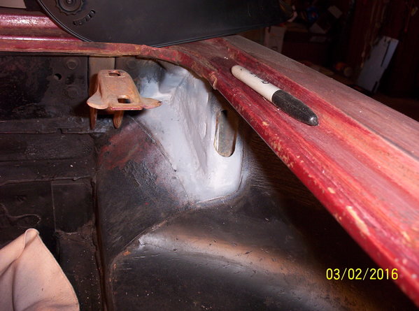 Top side.  I had a real hell hole of weld burn through (from rust and my lack of metal prep and weld skill) in the back corner where the engine compartment tapers back to a point.  It was not pretty, but I did finally get that filled.  There will be more seam sealer needed all through the engine compartment.