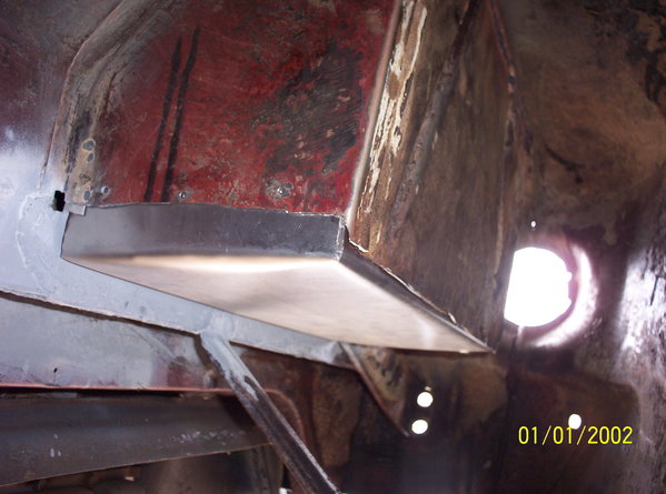 Underneath shot of tray location showing position of tray relative to original metal.