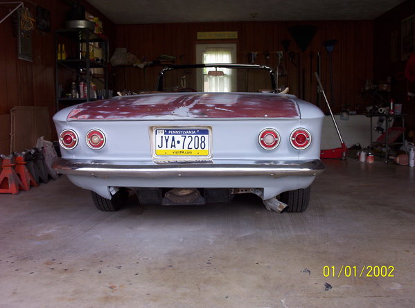 Looks nice now that it is not missing half the rear bodywork.  Also, the color of the primer is not too bad, some sort of grey with a hint of light blue.  Interesting...