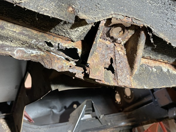 Rusted rear sub-frame rail on the 65. Will clean down to the frame and repair with steel.