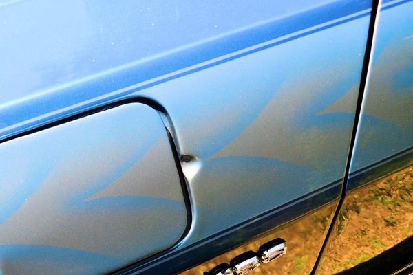 Closeup showing the paint accent detail on the left-front fender.