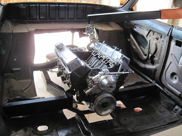 Place engine into car