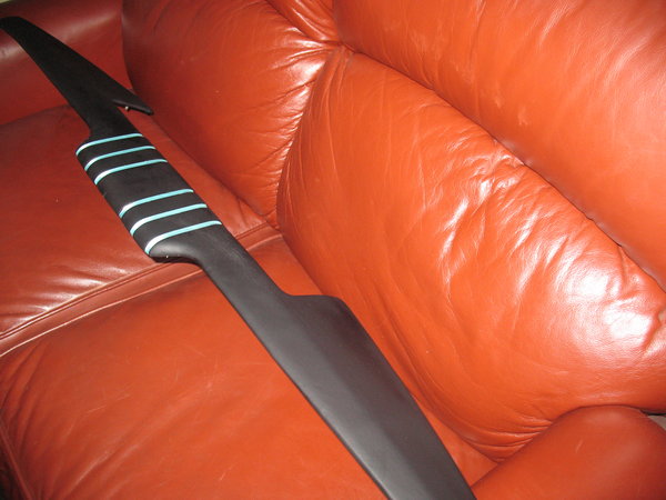 aqua coloured ribbon material set into grooves