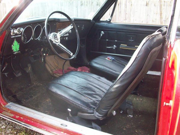 interior is currently out of the car now, and thankfully the floors aren't very rusty at all!  the back seat floor boards have virtually no rust at all suprisingly.