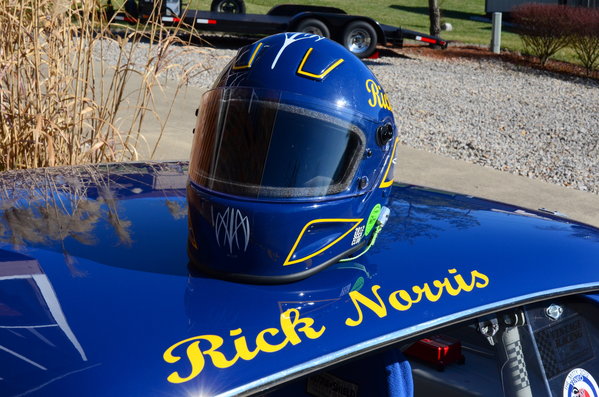 I painted my helmet myself except for the pin striping. Local striper Milt Wheeler did those along with the ones on the car.