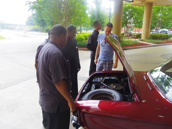 Everywhere she goes, she draws a crowd. Stopping here to take some time to pose for the stewards at the Marriott