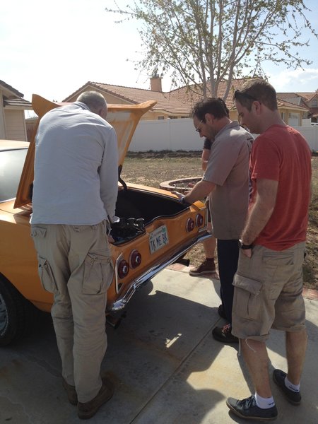 This is Kregg showing them his pride and joy. The '65 Corsa weber car that he has owned for over 20 years.