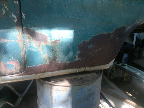 the rusted patch left on the coupe,see where the join is to the 4 door sill