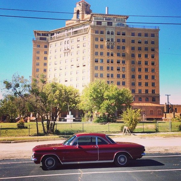 In front of the abandoned hotel in Mineral Wells, TX