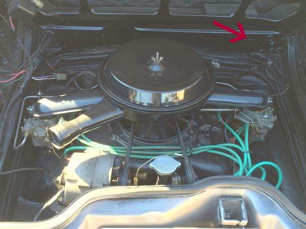 Pic of your engine compartment with what looks like holes for now removed A/C lines.