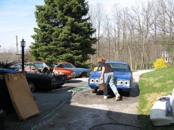 There I am giving it a long deserved bath. It only took two of us three hours.<br />If you notice, I'm wearing my new Corvair Forum tee shirt