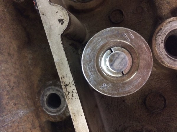 Intake valve showing gaps between wedges