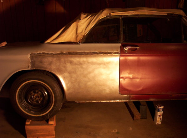 The welds are cleaned up some here.  I'm torn on trying to improve the door gap.  It is relatively straight, but with a more rounded edge than the original, and I'm not sure how anal I want to get with it when there is still so much more of the car to do.  I may come back to this part later when the rest of the rough bodywork is done.