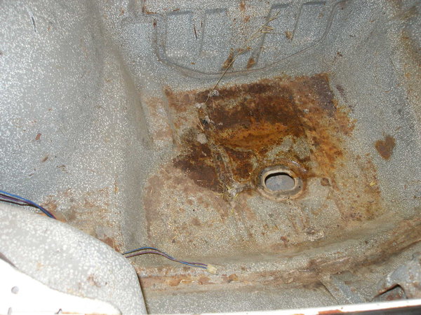 No holes in the trunk just surface rust.