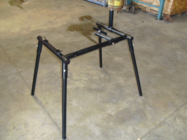 This is a Factory GM engine stand, the arm in the middle slides to each side, you can remove the bell housing or the oil pump housing all on this stand for repairs.