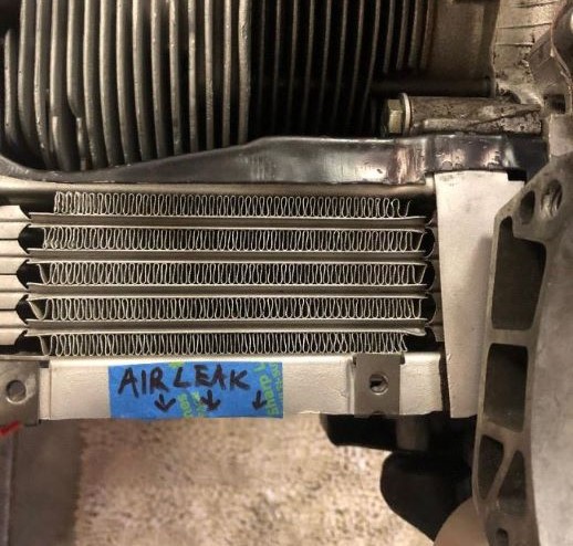 oil cooler air flow leak above flange.jpg