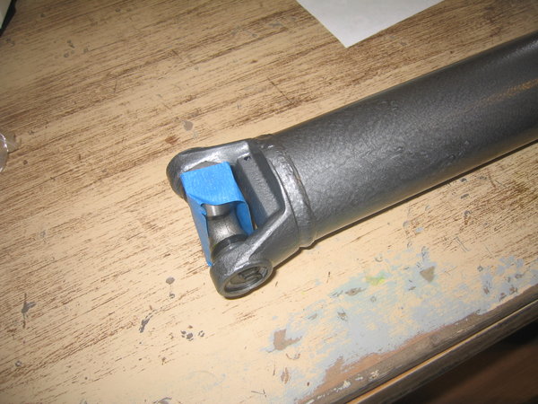 Tape up the loose ends of the new U-Joint to keep them in place while you work.  If one gets knocked loose and the rollers scatter, it would be a nightmare trying to find them all.  Good insurance.