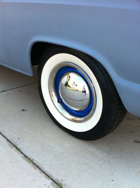 Coker wide whitewalls on fresh Rustoleum painted rims with stainless beauty rings and baby moon hubcaps.